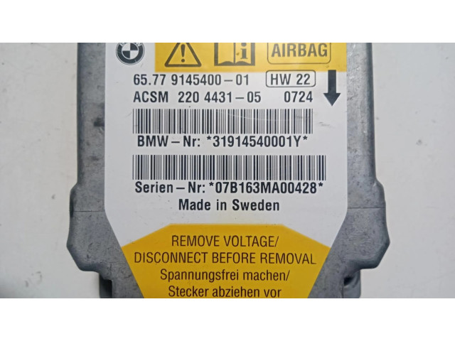 Блок подушек безопасности 65779145400   BMW 6 E63 E64
