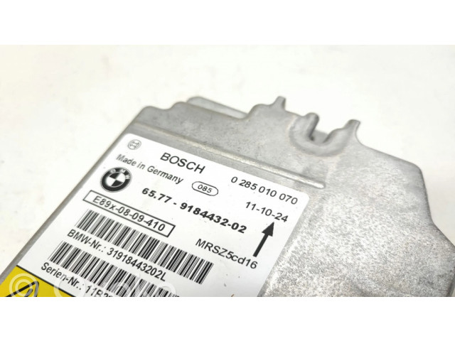 Блок подушек безопасности 0285010070, 9184432   BMW X1 E84
