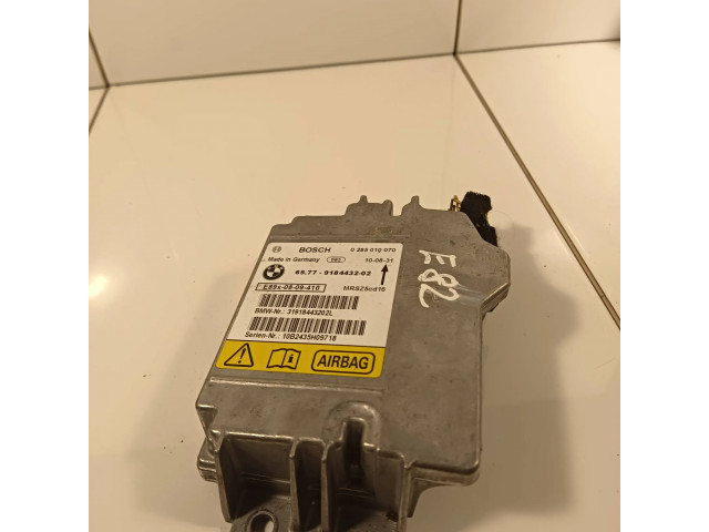 Блок подушек безопасности 9184432, 0285010070   BMW 1 E82 E88