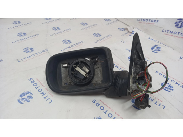 Zpětné zrcátko  levé BMW 7 E38 2000    