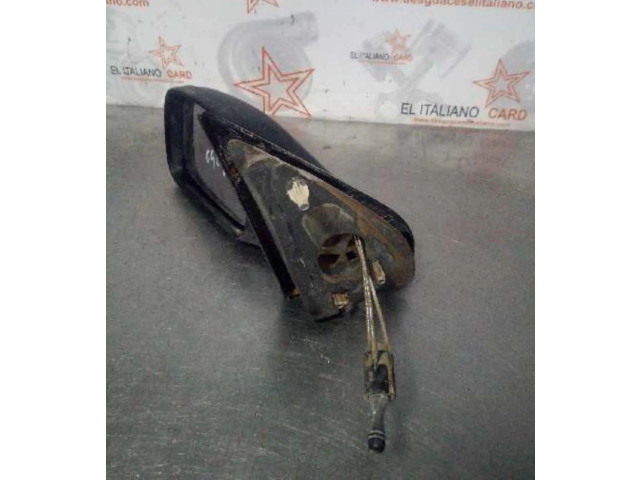 Zpětné zrcátko  Peugeot 106     
