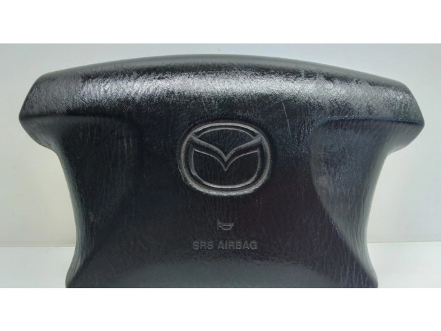 Подушка безопасности водителя T93059A   Mazda 323 F