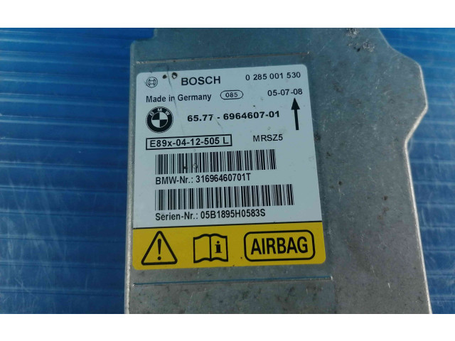 Блок подушек безопасности 6964607, 0285001530   BMW 1 E81 E87