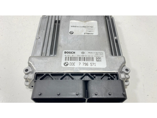 Блок управления двигателя 7796571, 0281011564   BMW X3 E83