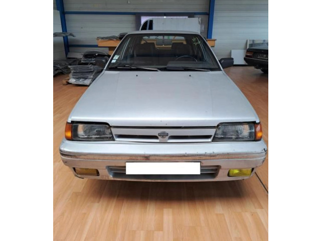 Zpětné zrcátko  Nissan Sunny 1990    