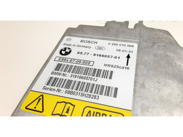 Блок подушек безопасности 0285010066, 9166057   BMW 1 E81 E87