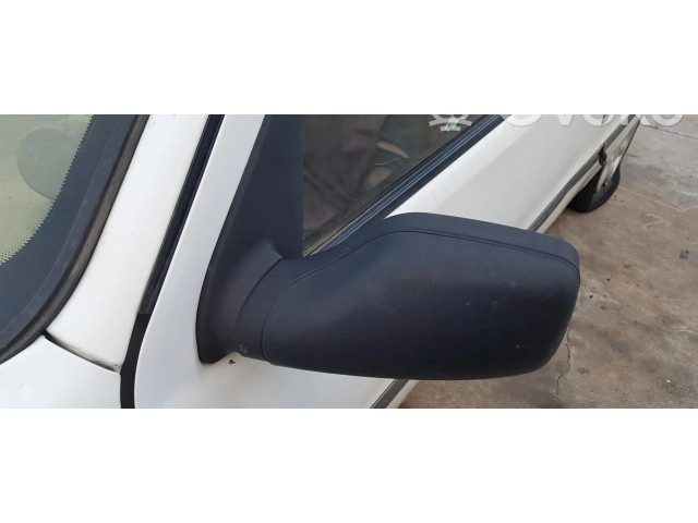 Zpětné zrcátko  Peugeot 106     