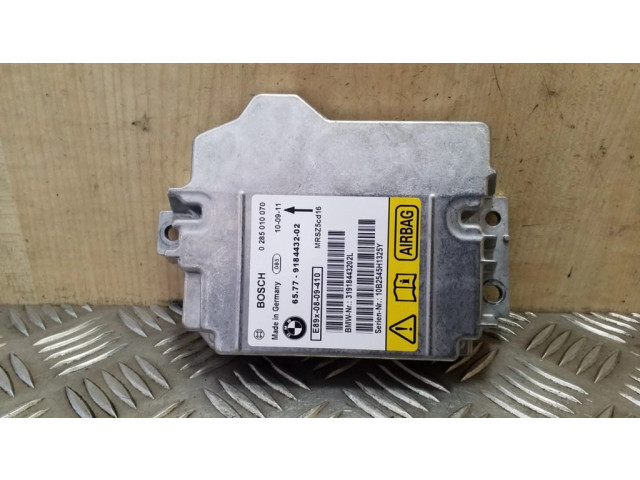 Блок подушек безопасности 0285010070, 6577918432   BMW X1 E84