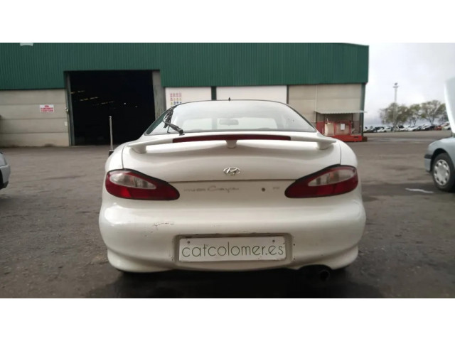 Přední světlo  1010495   Hyundai Coupe 1997