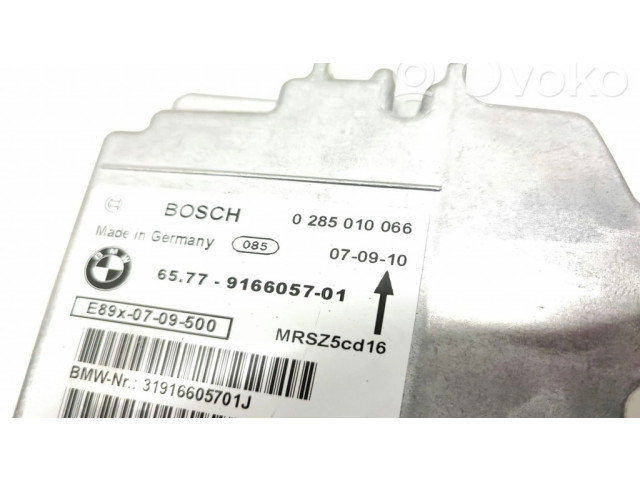 Блок подушек безопасности 0285010066, 9166057   BMW 3 E92 E93