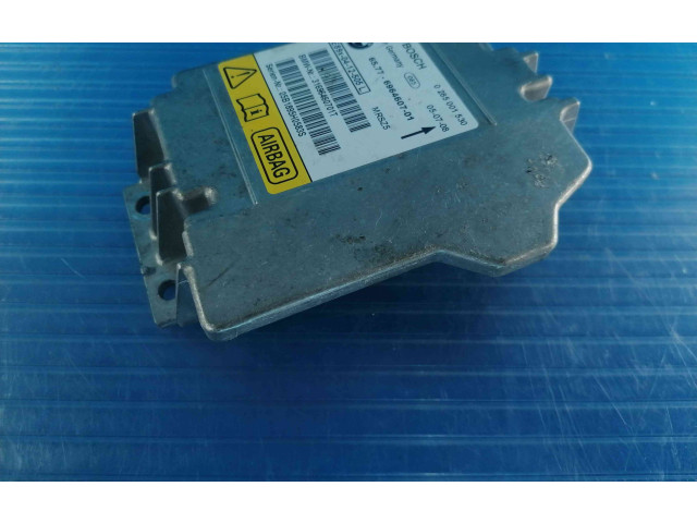 Блок подушек безопасности 6964607, 0285001530   BMW 1 E81 E87