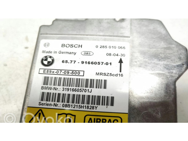 Блок подушек безопасности 0285010066, 9166057   BMW 3 E92 E93
