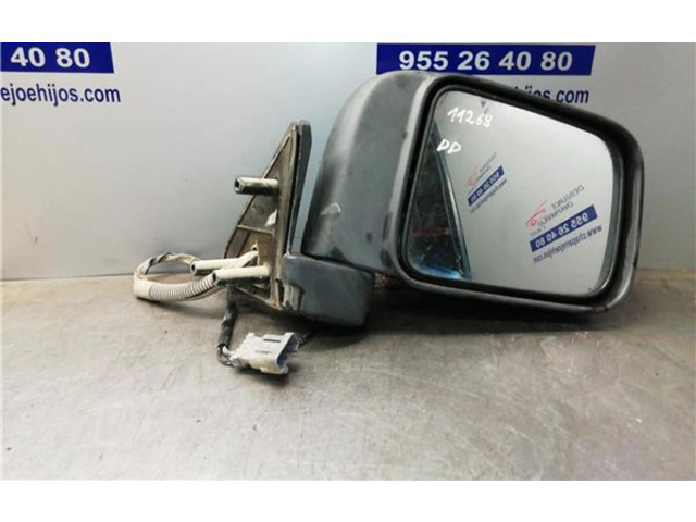 Zpětné zrcátko  Nissan Navara D22 2004    