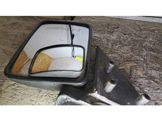 Zpětné zrcátko  levé Hyundai H-100 1995  E4011301, 011301  