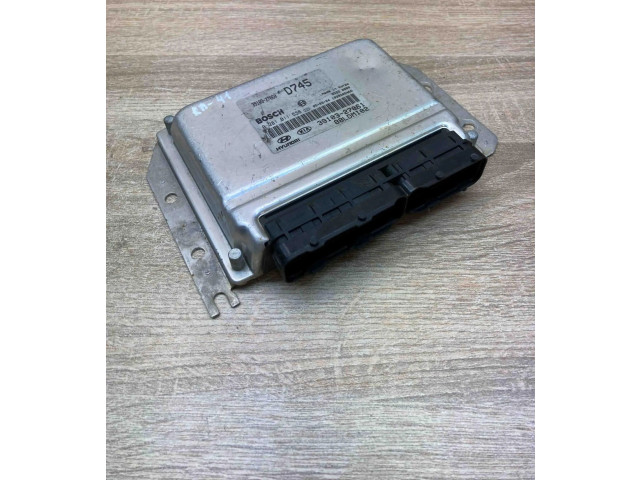 Řídící jednotka 3910327061, 0281011538   KIA Cerato 2000