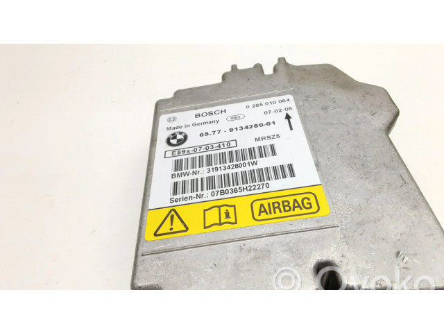 Блок подушек безопасности 0285010064, 9134280   BMW 3 E92 E93