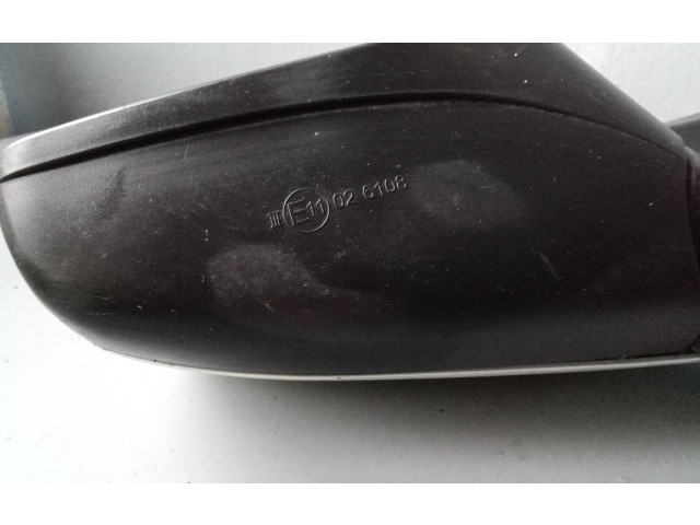 Zpětné zrcátko  Mazda Demio 2001  E11026108  