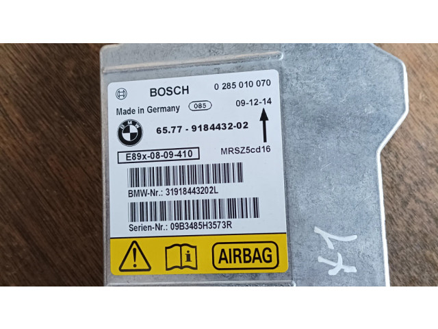 Блок подушек безопасности 0285010070, 9184432   BMW X1 E84