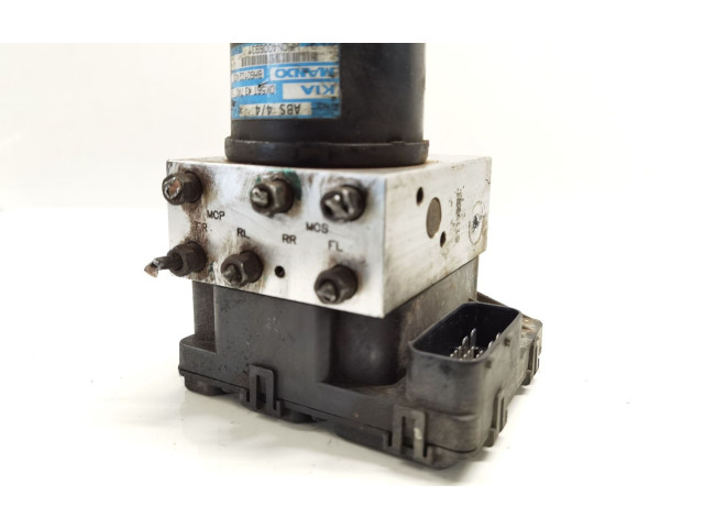 Jednotka ABS 0K56T437A0, BH60102400   KIA Carnival 2001