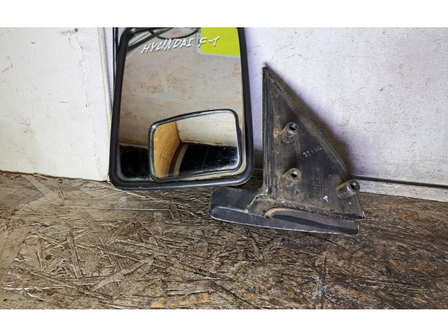 Zpětné zrcátko  levé Hyundai H-100 1995  E4011301, 011301  