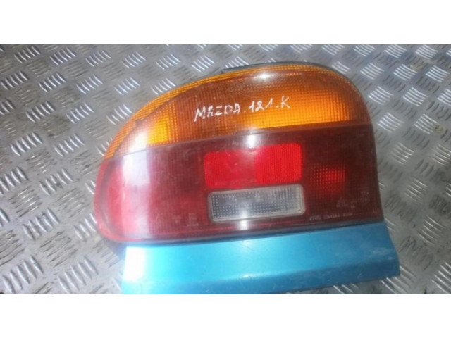 Задний фонарь левый сзади 22061364    Mazda 121 SM   1996-2002 года