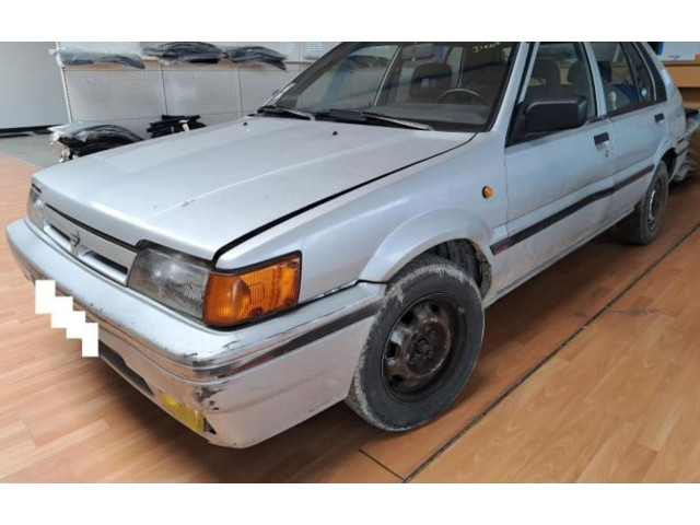 Zpětné zrcátko  Nissan Sunny 1990    