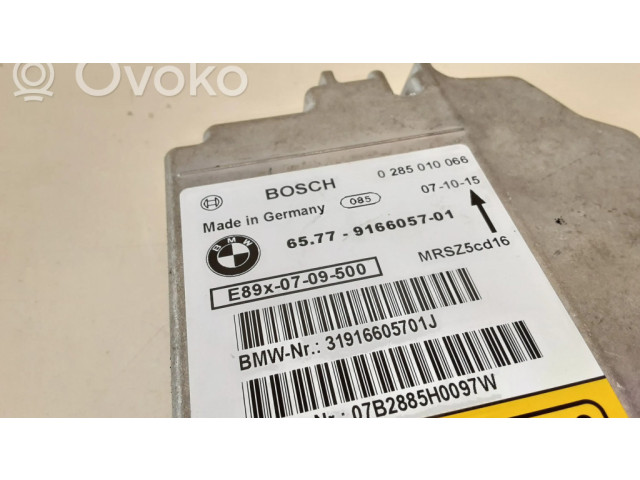 Блок подушек безопасности 9166057, 0285010066   BMW 3 E92 E93