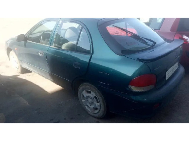 Přední světlo     Hyundai Accent 1999