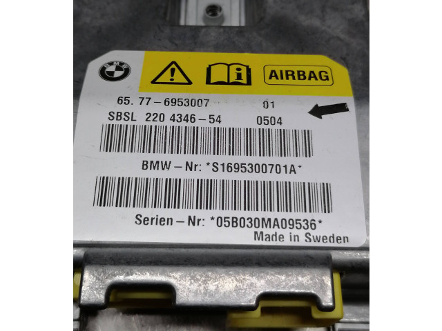 Блок подушек безопасности 6953007   BMW 6 E63 E64