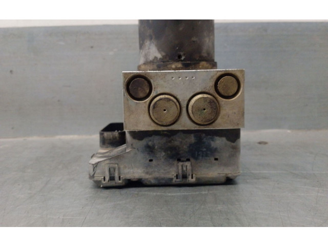 Jednotka ABS 0K56T437A0, BH60102400   KIA Carnival 2001