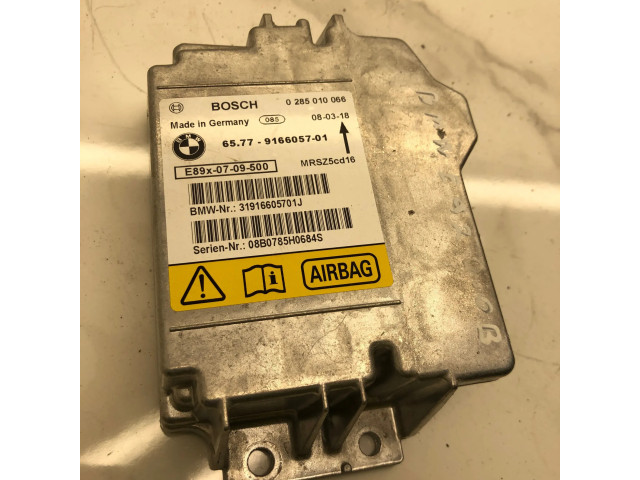 Блок подушек безопасности 9166057, 31916605701J   BMW 3 E92 E93