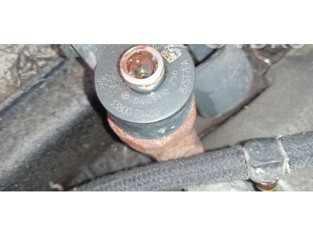 Vstřikovač 0445110256, 338002A400   Hyundai i30     