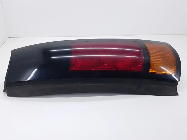 Задний фонарь левый 16511106    Pontiac Trans Sport   