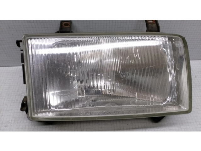 Přední světlo  30213637000, 7R0144438   Volkswagen Transporter - Caravelle T4 1993