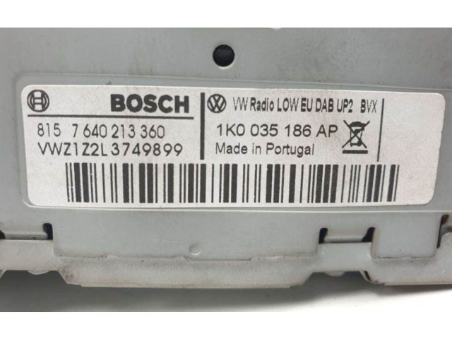 Радио/ проигрыватель CD/DVD / навигация 1K0035186AP   Volkswagen Passat Alltrack 2011