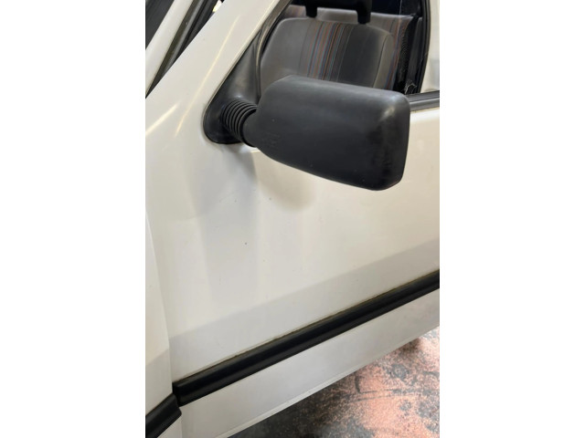 Zpětné zrcátko  Fiat Uno 1990    