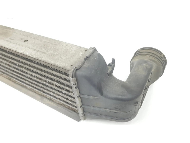 Интеркулер  7789793, 7793370   BMW 3 E46 2.0