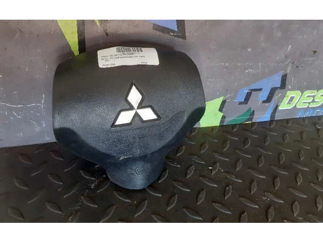 Подушка безопасности водителя 7030A105XA   Mitsubishi Lancer X
