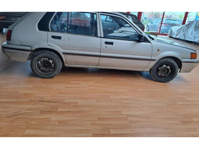 Zpětné zrcátko  Nissan Sunny 1990    