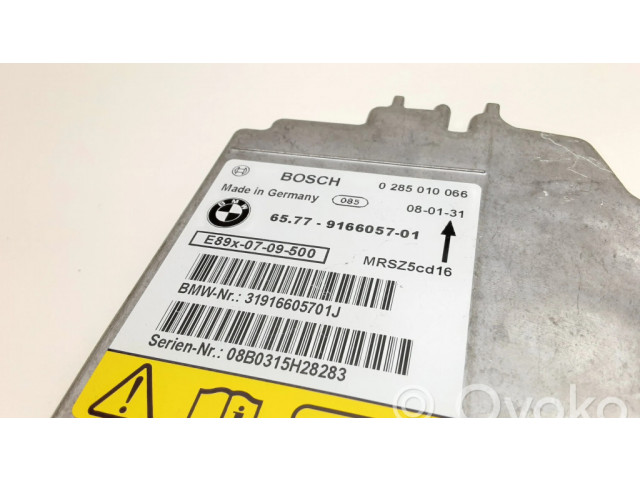 Блок подушек безопасности 0285010066, 9166057   BMW 1 E81 E87