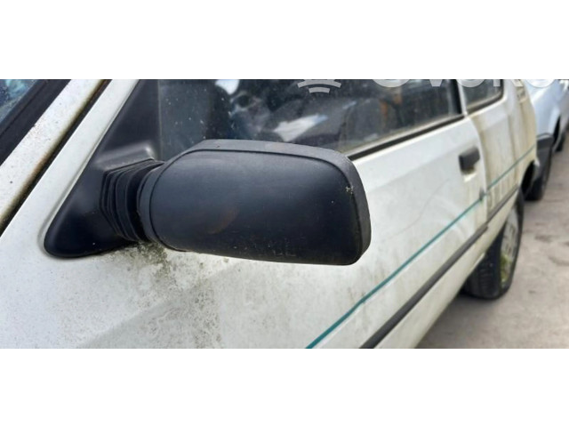 Zpětné zrcátko  Peugeot 205 1990    
