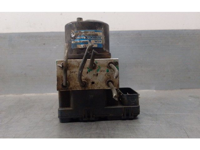 Jednotka ABS 0K56T437A0, BH60102400   KIA Carnival 2001