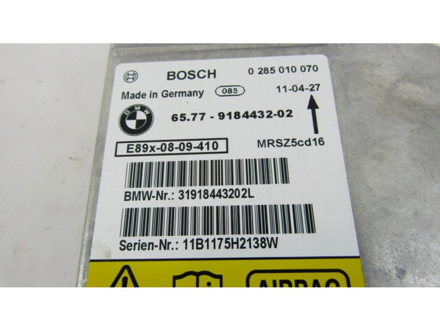 Блок подушек безопасности 0285010070   BMW X1 E84