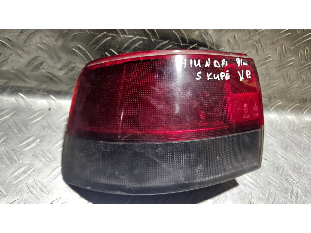 Задний фонарь  022313, 012311    Hyundai Scoupe   