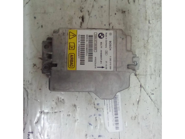 Блок подушек безопасности 0285010066   BMW 1 E82 E88