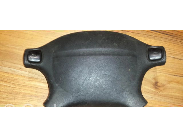 Подушка безопасности водителя A10400664058   Mazda 323