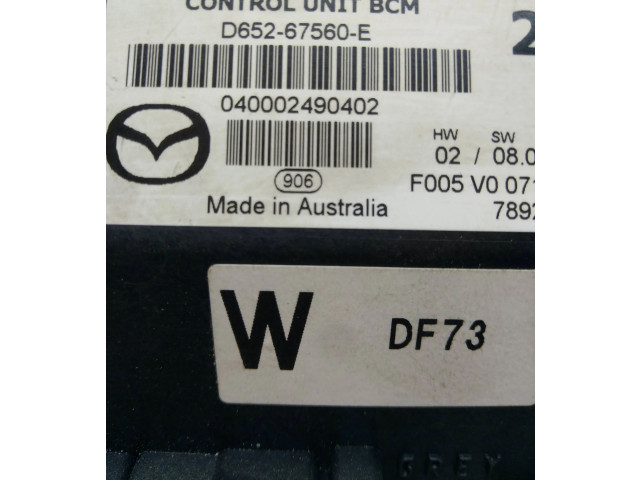 Řídící jednotka D65267560E, 040002490402   Mazda 2 2008