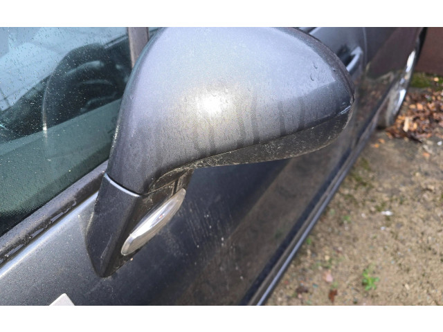 Zpětné zrcátko  Peugeot 308 SW  2009  0306040, 0308094  