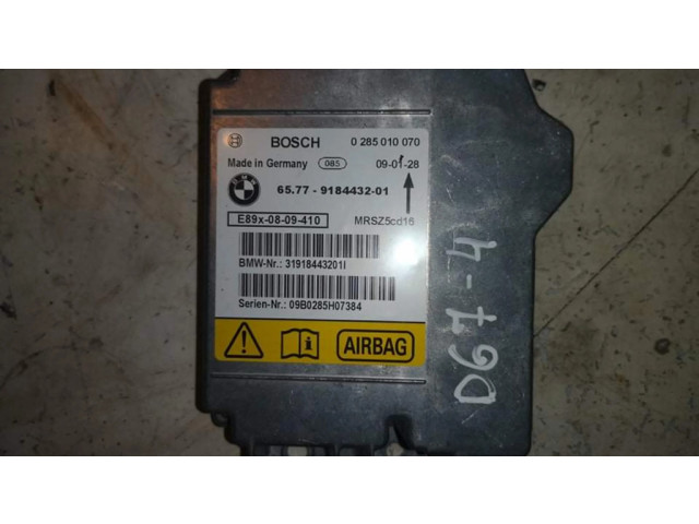 Блок подушек безопасности 0285010070, D67-4   BMW 3 E92 E93