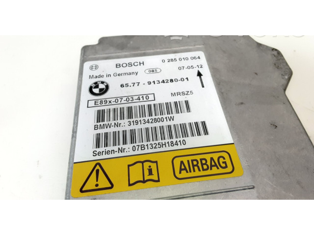 Блок подушек безопасности 0285010064, 9134280   BMW 1 E81 E87
